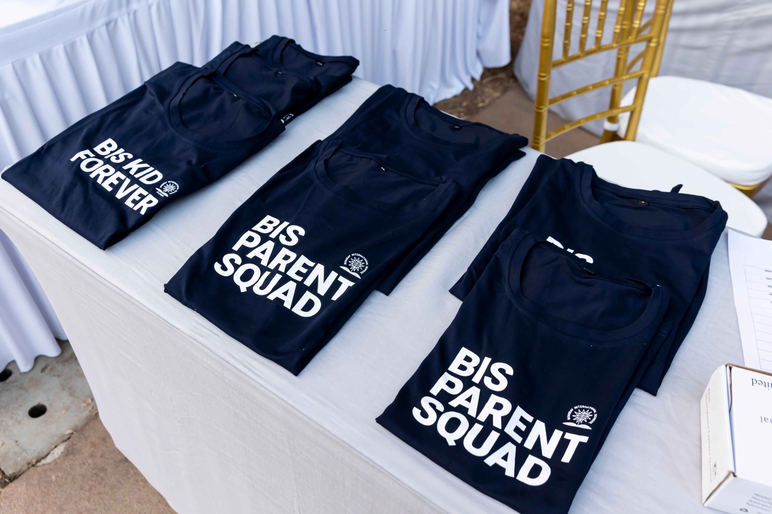 3 sets of t-shirts displaying "bis parent squad"