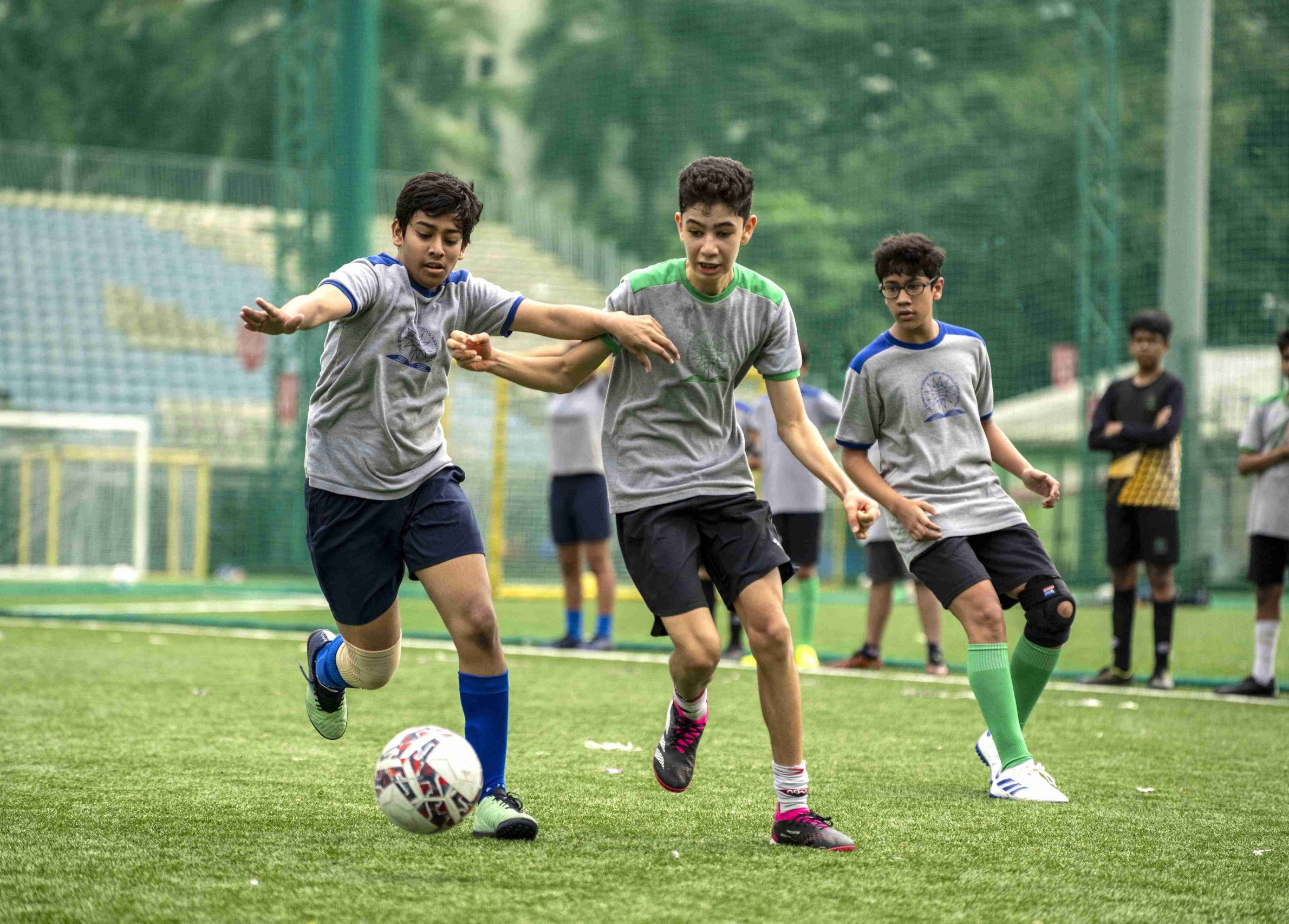 middle school students playing soccer