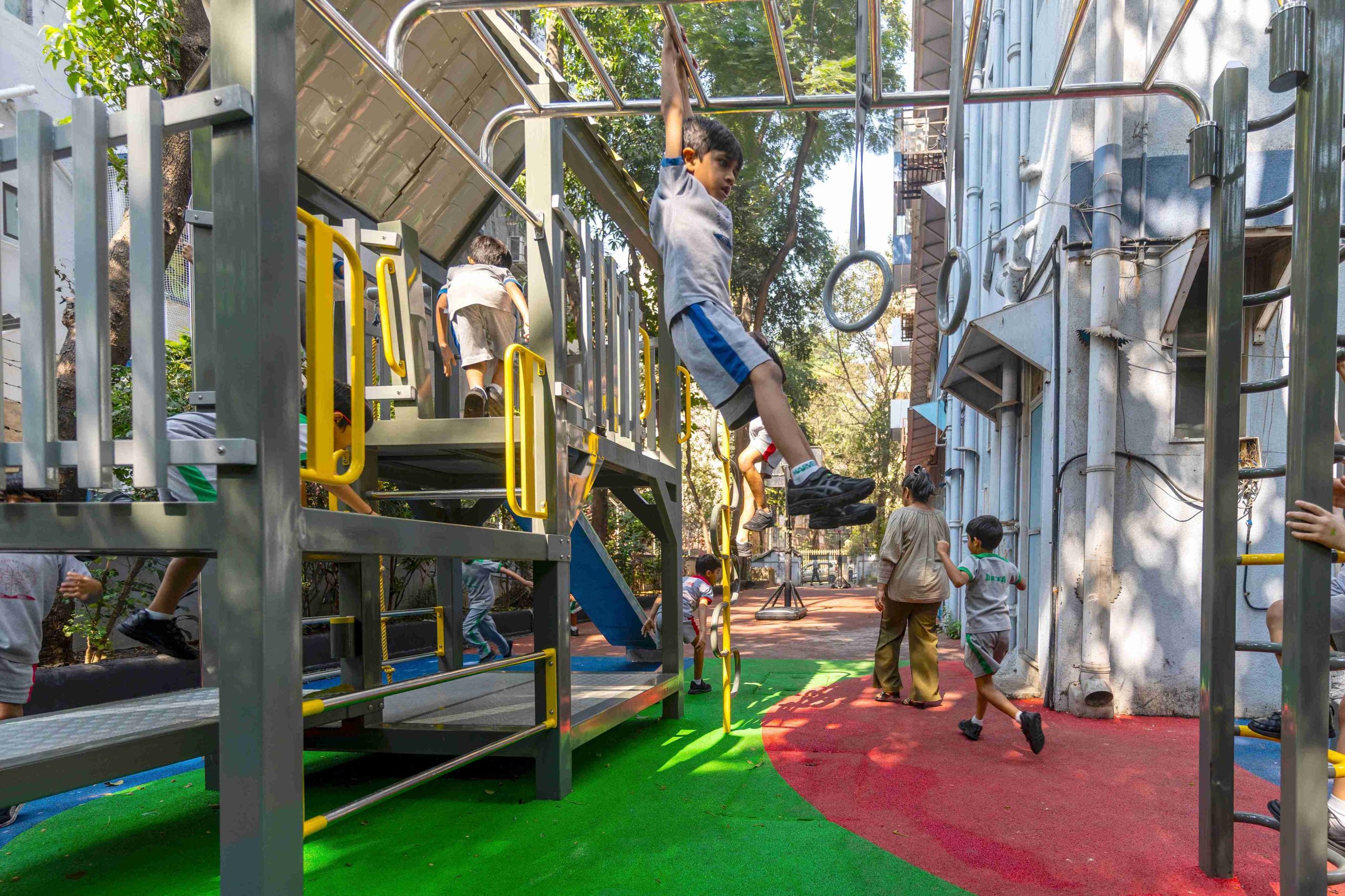 primary school kid hanging with bars