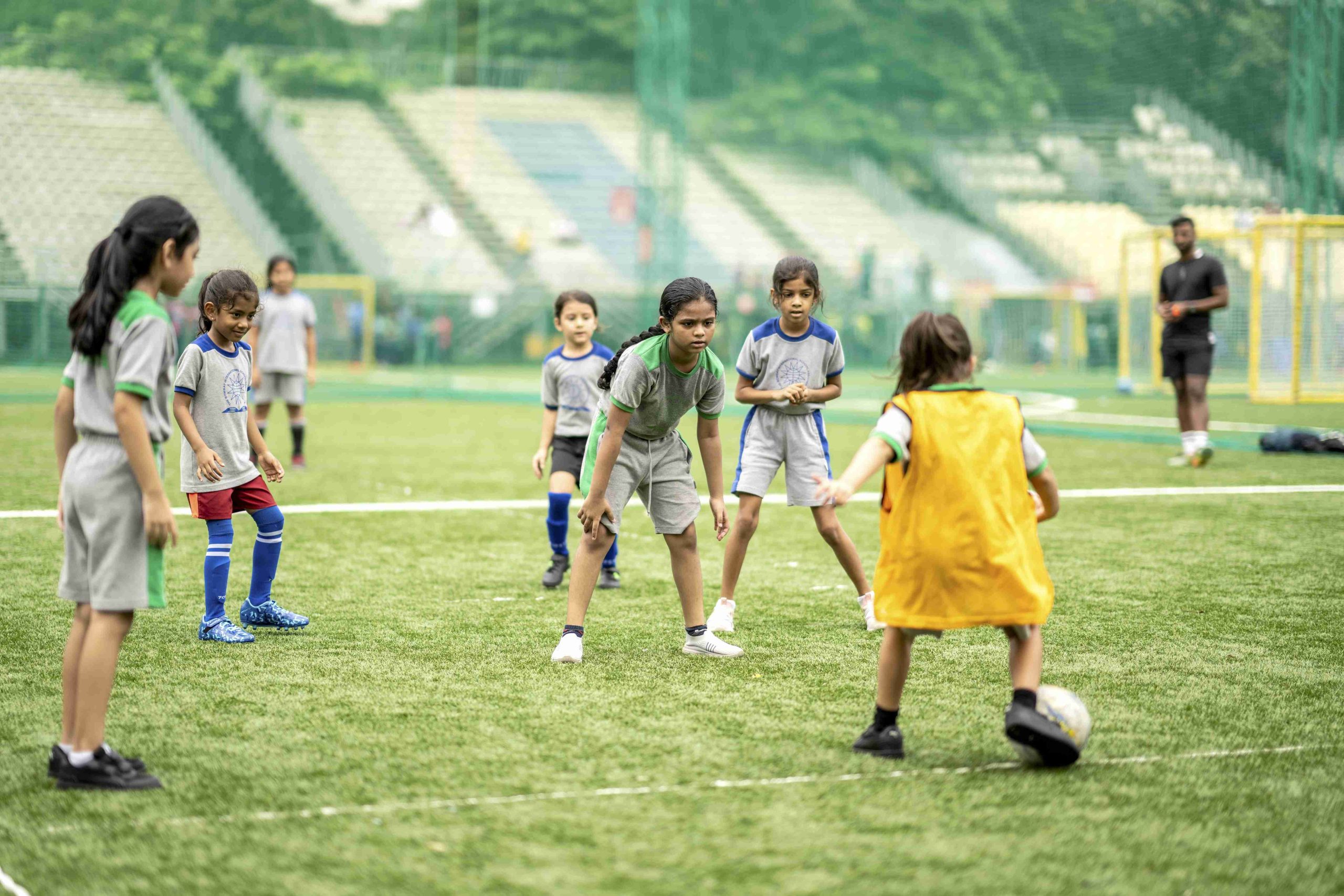 primary kids playing football match