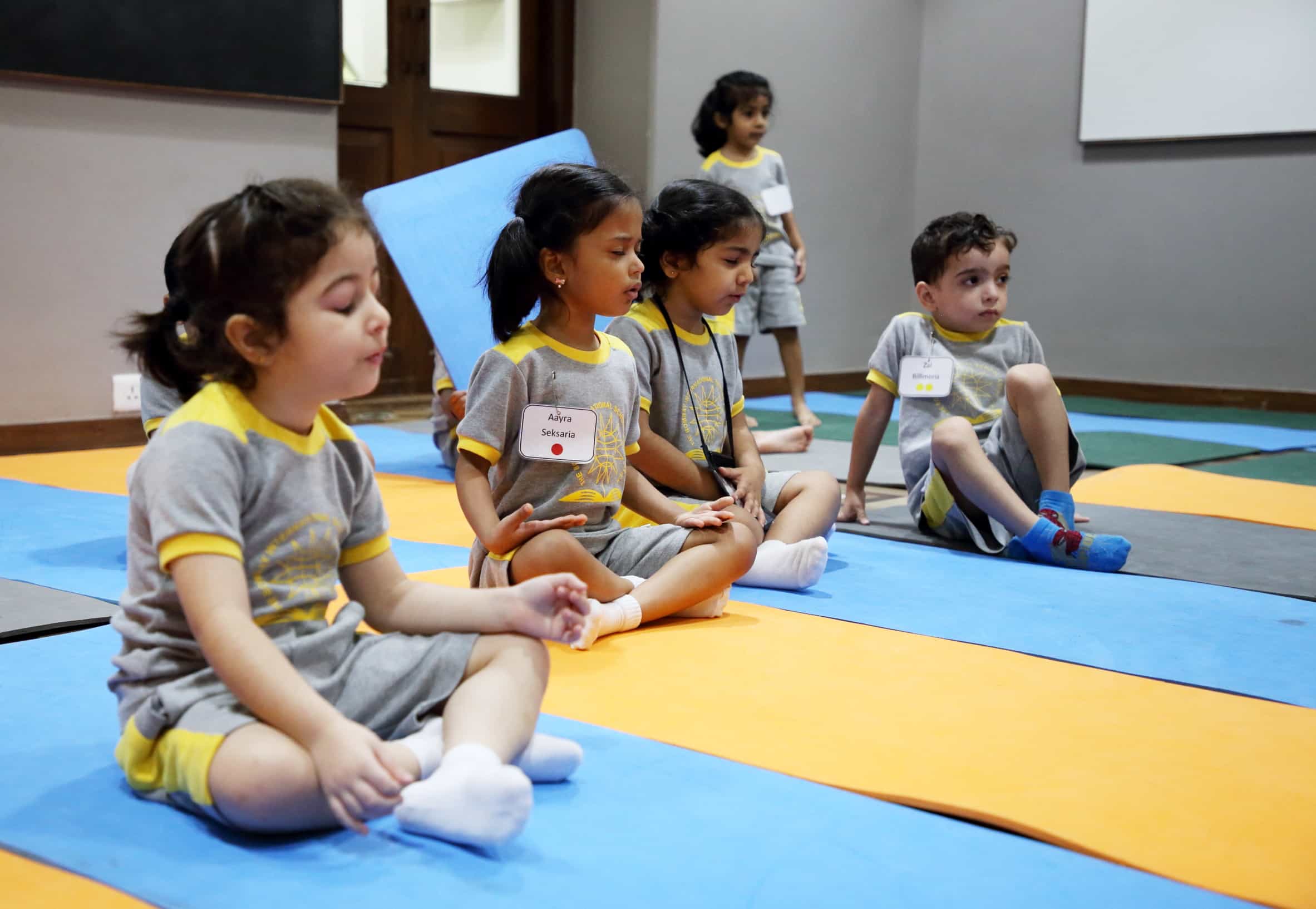 taking care of student's well being - kids doing yoga